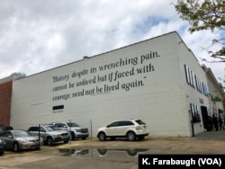 The Legacy Museum, which opened April 26, 2018, at the site of a slave warehouse in Montgomery, Alabama, has written on one side of the museum a Maya Angelou quote.