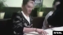 Image made from video of hacker's arrest in Czech Republic, Oct. 19, 2016.