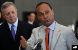 FILE - Rep. Luis Gutierrez, right, a Democrat from Illinois, speaks during a news conference regarding federal policy on deportations in Chicago, June 13, 2014.