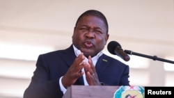 FILE - Mozambique's President Filipe Nyusi speaks during Armed Forces Day celebrations in Pemba, Mozambique, Sept. 25, 2021.