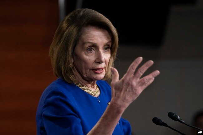 Speaker of the House Nancy Pelosi, D-Calif., talks with reporters during her weekly news conference, on Capitol Hill in Washington, Thursday, Feb. 7, 2019.