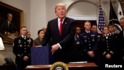 President Donald Trump participates in a signing ceremony for the National Defense Authorization Act for Fiscal Year 2018 at the White House, Dec. 12, 2017.