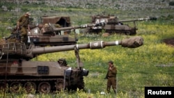 Đơn vị pháo binh di động của Israel gần thị trấn Katzrin, Cao nguyên Golan, 19/3/2014.