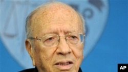 Tunisian interim Prime Minister Beji Caid Essebsi addresses reporters during a press conference held at the presidential palace in Carthage, outside Tunis, March 7, 2011