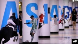 Áp phích quảng cáo Đại hội Thể thao Á Châu 2014 được trưng bày tại một ga tàu điện ngầm ở Seoul, Hàn Quốc, ngày 18/7/2014.