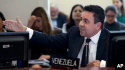 Organization of American States (OAS) Alternate Representative of Venezuela Samuel Moncada, speaks during Permanent Council of the Organization of American States (OAS) in Washington, April 3, 2017, to consider the recent events in Venezuela. 