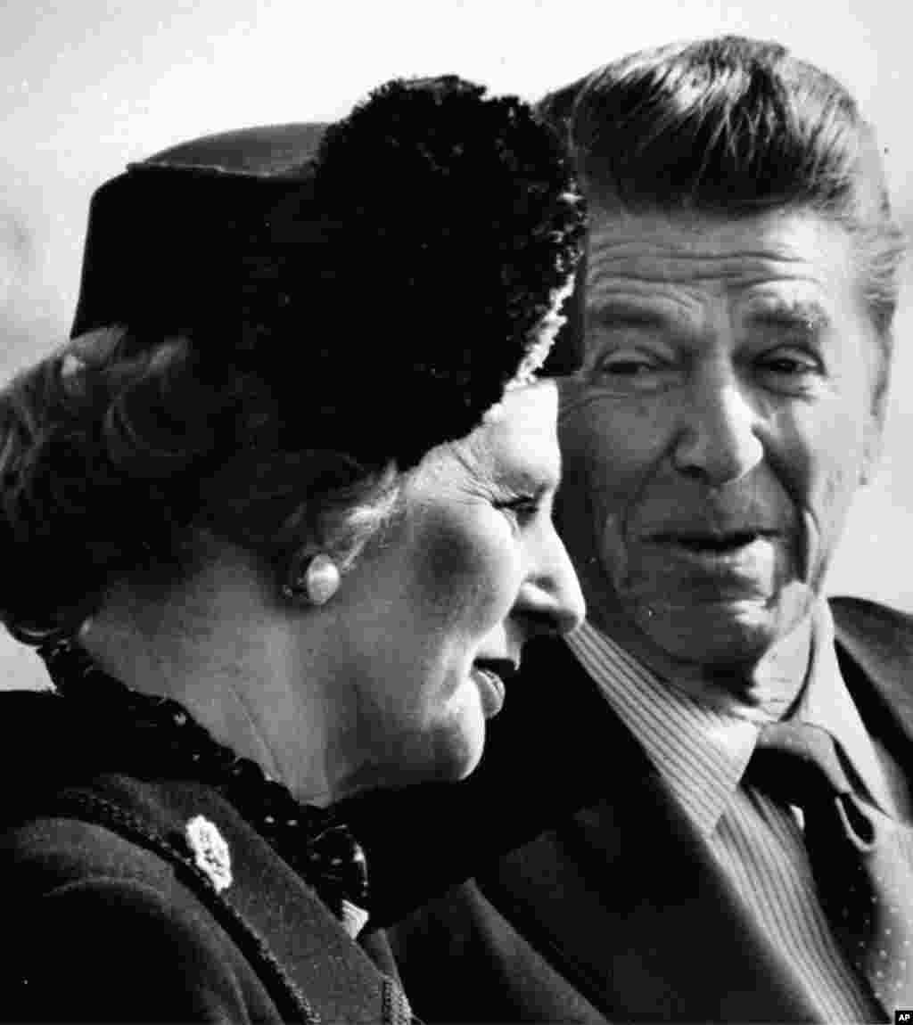 Then President Ronald Reagan chats with British Prime Minister Margaret Thatcher during State Arrival Ceremonies at the White House, Feb. 26, 1981.