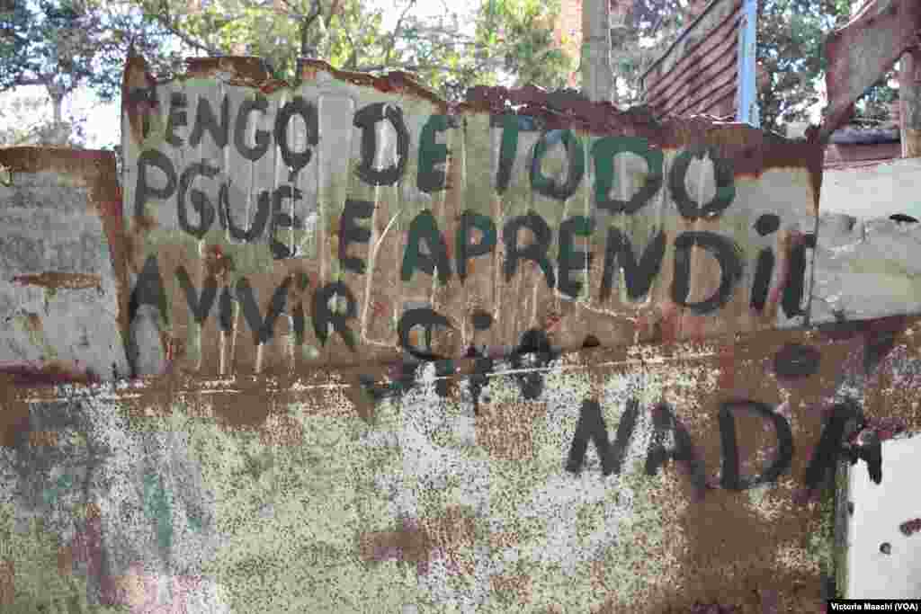 "I have everything, because I've learned to live without anything," reads a sign near Calabazar, on the outskirts of Havana, Cuba.
