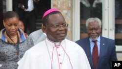 FILE - Monseigneur Marcel Utembi, a Catholic church mediator arrives for a meeting in Kinshasa, Democratic Republic of Congo, Wednesday, Dec. 21, 2016.
