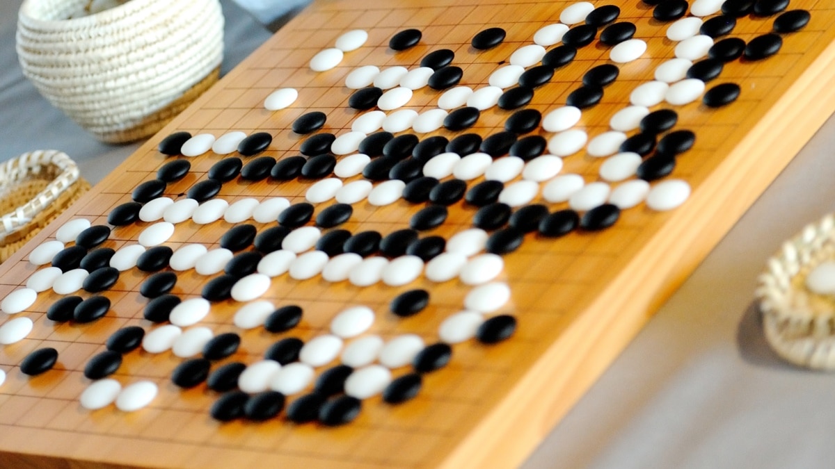 Google artificial intelligence beats champion at world's most complicated  board game