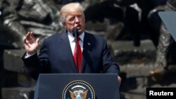 President Donald Trump gives a public speech in front of the Warsaw Uprising Monument at Krasinski Square, in Warsaw, July 6, 2017.