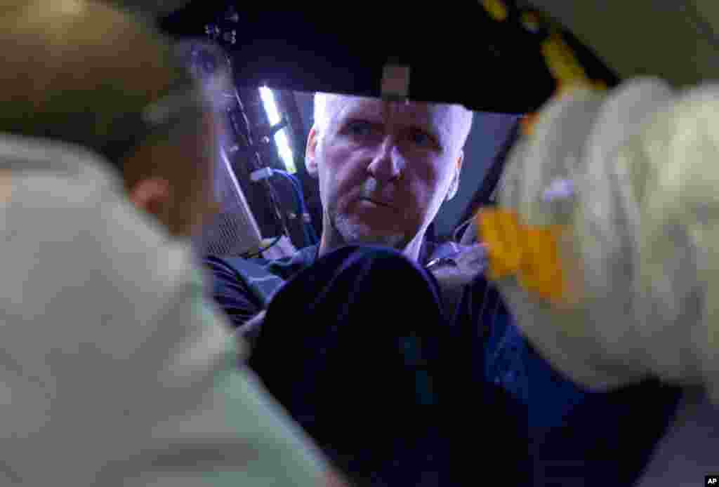 James Cameron inside the pressure sphere simulator at Acheron Project offices in Sydney, Australia. (Photo: Brook Rushton)
