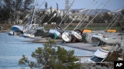 Damaged sail boats are shown in the aftermath of Hurricane Irma, Sept. 11, 2017, in the Florida Keys.