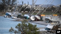Damaged sail boats are shown in the aftermath of Hurricane Irma, Sept. 11, 2017, in the Florida Keys.