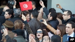 Des Tunisiens manifestant après l'assassinat de Chokri Belaïd