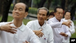 FILE - Elderly men exercise at a park in Bangkok, Thailand, Dec. 16, 2011. Healthcare costs could total $20 trillion over next 15 years, threatening future growth in Asia.