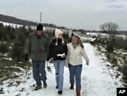 The Sylvester family strolls on a farm in Round Hill, Virginia in search of the perfect Christmas tree.
