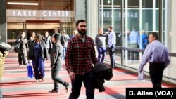 Local business owner Brad Rohles walks to work across the Minneapolis Skyway. Rohles estimates the Skyway allows him to spend just a few minutes outside in the harsh winter weather, while still maintaining an active lifestyle. 