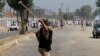 Police Clash With Protesters in Indian Kashmir