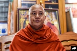 FILE - Wirathu, a high-profile leader of the Myanmar Buddhist organization known as Ma Ba Tha, is interviewed at his monastery in Mandalay, Myanmar, Nov. 12, 2016.