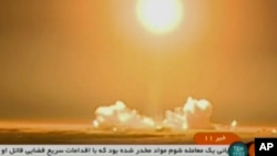 Video image from Iranian state TV shows the launch of a rocket carrying a Payam satellite at Imam Khomeini Space Center, a facility under the control of the country's Defense Ministry, in Semnan province, Iran, Jan. 15, 2019. 