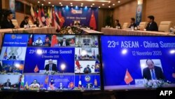 Vietnam's Prime Minister Nguyen Xuan Phuc addresses counterparts at the ASEAN-China summit of the Association of Southeast Asian Nations (ASEAN), held online due to the COVID-19 coronavirus pandemic, in Hanoi on November 12, 2020. (Photo by Nhac NGUYEN / 