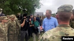 Acting U.S. Defense Secretary Patrick Shanahan speaks with troops and border patrol officials near the U.S.-Mexico border in McAllen, Texas, May 11, 2019.