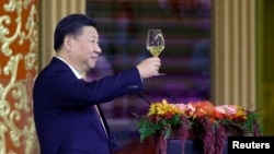 China's President Xi Jinping delivers a toast at a state dinner at the Great Hall of the People in Beijing, Nov. 9, 2017.