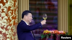 China's President Xi Jinping delivers a toast at a state dinner at the Great Hall of the People in Beijing, Nov. 9, 2017.