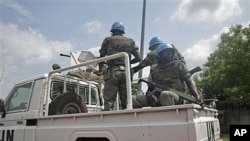 United Nations soldiers from Senegal patrol the streets of Abidjan, Ivory Coast, Dec 9, 2010 (file photo)