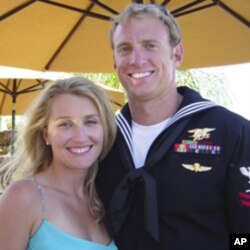 Aaron Vaughn, right, and his wife, Kimberly. Vaughn, a 30-year-old father of two, was among the Navy SEALs killed in Afghanistan.