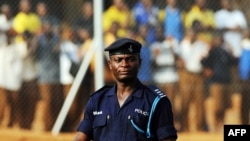A Ghana policeman watches Egypt's football team's practice in Kumasi, 23 January 2008, during the African Cup of Nations football championship. 