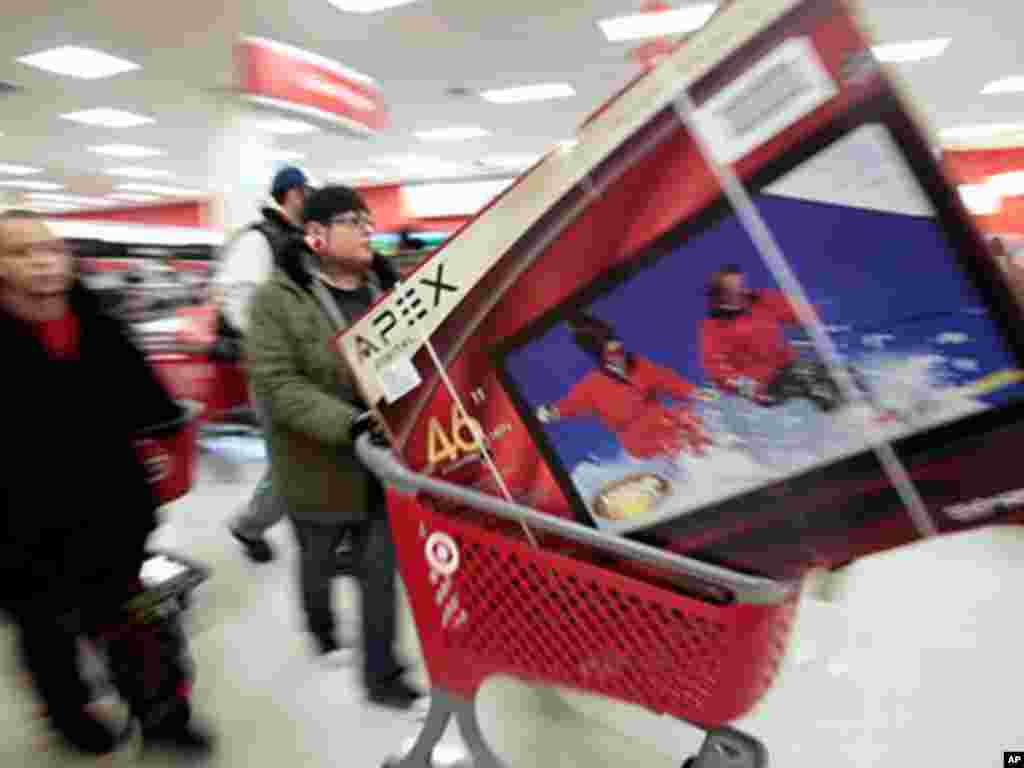 Shoppers snagged deals on big purchases, including televisions during Black Friday sales last year. (AP)