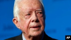 FILE - Former U.S. President Jimmy Carter speaks during a forum in Boston, Aug. 12, 2015. 