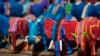 Finished toy animals made from discarded flip-flops are laid out in rows to dry in the sun at the Ocean Sole flip-flop recycling company in Nairobi, Kenya. 
