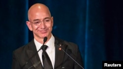 FILE - Blue Origin, owned by Amazon.com founder Jeff Bezos, has finished work on the engine for its suborbital spaceship, the New Shepard.