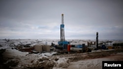 Site de forage de pétrole de schiste dans le Dakota du Nord (Reuters)