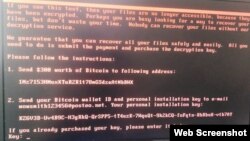 (FILE) A computer screen showing message from the NotPetya virus attack in June 2017 in Ukraine.