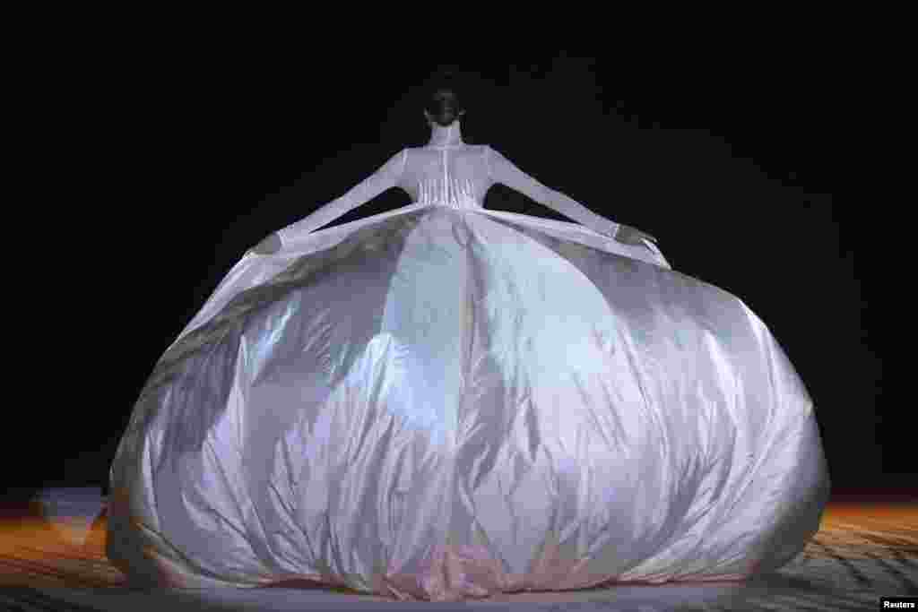 A model presents a creation by Stephane Rolland during the 2018 spring/summer Haute Couture collection fashion show in Paris, France.