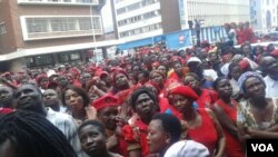 MDC-T supporters outside the party's headquarters in Harare.