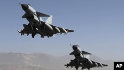 A Chinese Air Force J-10 fighter jets take off during a training in Lhasa, the capital of Tibet, China, January 31, 2012.