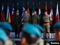 From left, Anton Waldner, new major general of European Forces; Adrian Bradshaw, general of European Forces; Mikhail Kostarakos, chairman of the European Union Military Committee; and James Rupert Everard, general of European Forces, attend a EUFOR change-of-command ceremony in Sarajevo, Bosnia and Herzegovina, March 28, 2017.