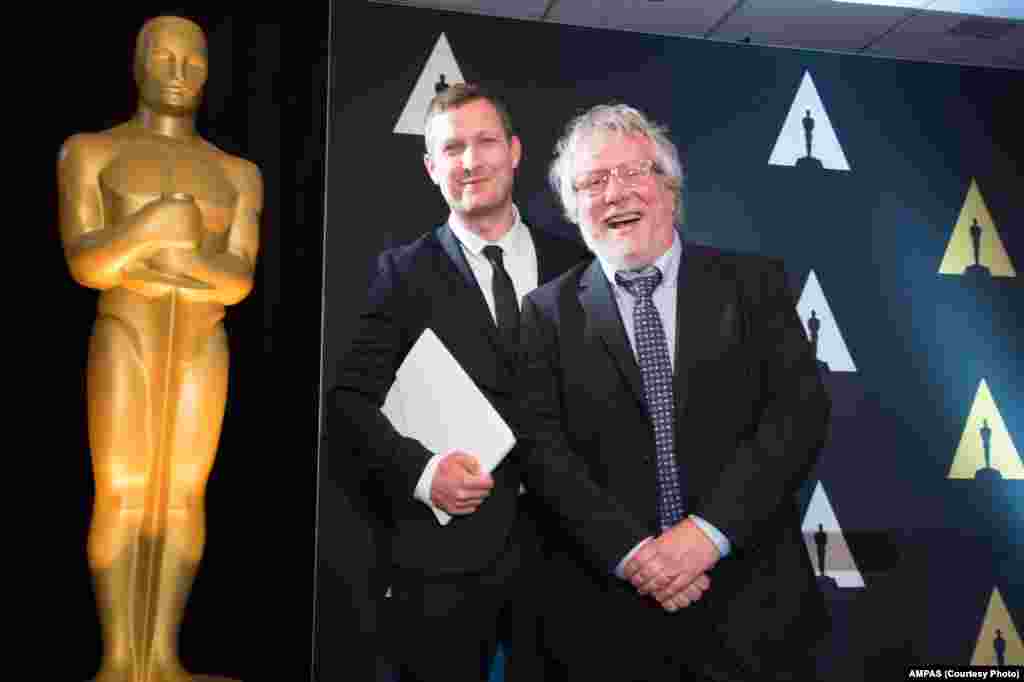 Foreign Language Film Award nominee Tobias Lindholm, “A War” and presenter Larry Karaszewski at the reception for the Foreign Language Film Award category for the 88th Oscars® on February 26, 2016. 