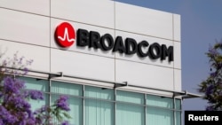 FILE - The Broadcom logo is pictured on an office building in Rancho Bernardo, California, May 12, 2016. 