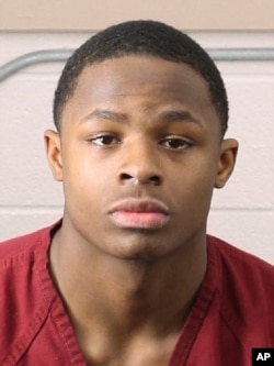 This photo provided by the Birmingham Police Department shows Michael Jerome Barber, a high school student who was charged March 9, 2018, with manslaughter and illegal firearms possession in a classroom shooting that killed a fellow student.