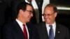 U.S. Secretary of the Treasury Steven Mnuchin talks to Financial Action Task Force President Marshall Billingslea as they pose for the official photo at the G-20 Meeting of Finance Ministers in Buenos Aires, Argentina, July 21, 2018. 