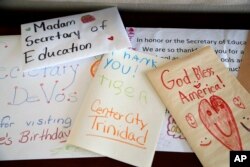 Cards from schoolchildren are seen in the office of Education Secretary Betsy DeVos, Aug. 9, 2017, at the Education Department in Washington.