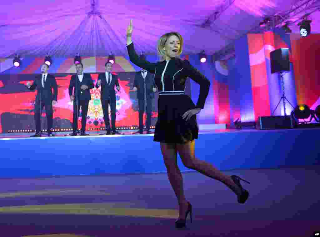 Russian Foreign Ministry spokeswoman Maria Zakharova dances &lsquo;Kalinka&rsquo;, one of the most well-known Russian folk songs, during a reception for journalists at the ASEAN - Russia summit in the Black Sea resort of Sochi, Russia, May 19, 2016.