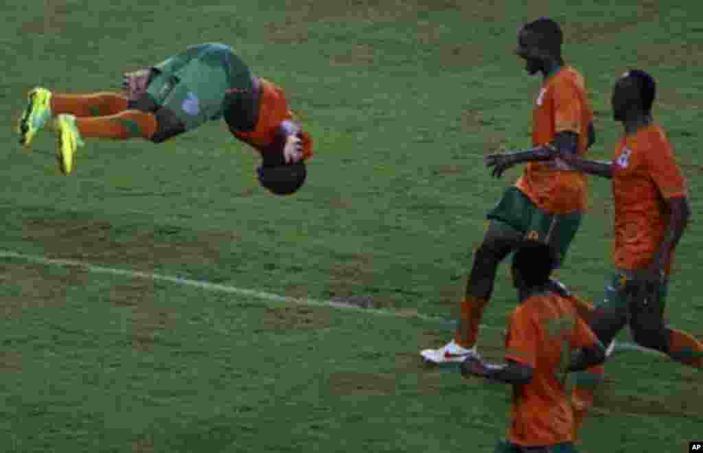 Emmanuel Mayuka (L of Zambia celebrates after scoring a goal against Ghana during their African Nations Cup semi-final soccer match at Estadio de Bata "Bata Stadium" in Bata February 8, 2012.