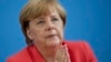 Merkel Calls on Neighbors to Share Migrant Burden